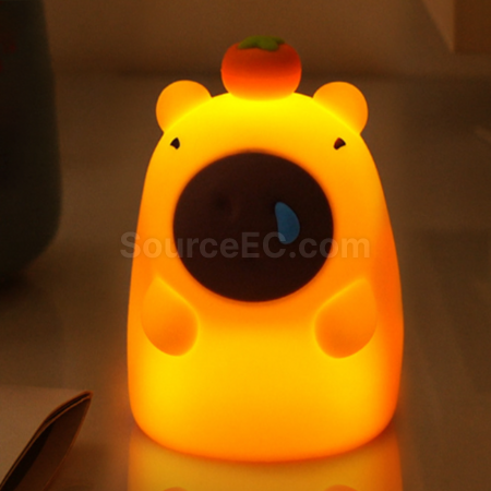 Capybara taps the small night light